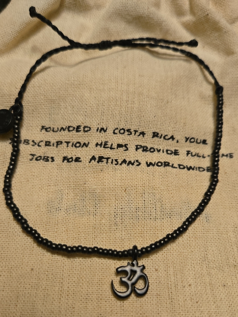 Black Beaded  Bracelet with Ohm Charm